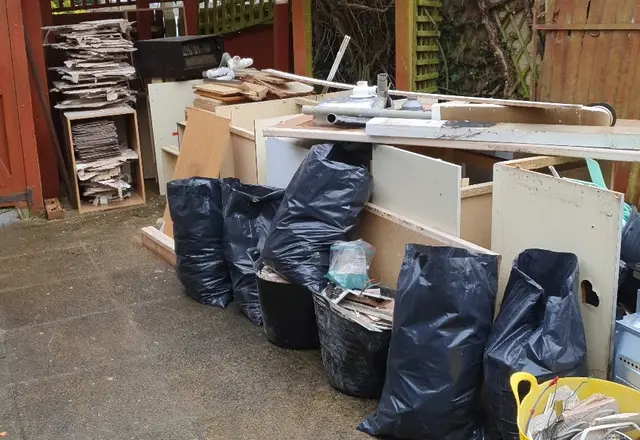 pile of household rubbish and bulky waste outside property in Richmond