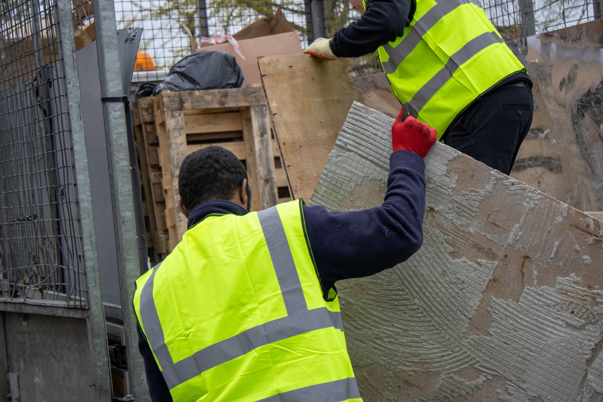bulky waste collection Sevenoaks workers loading household waste into truck