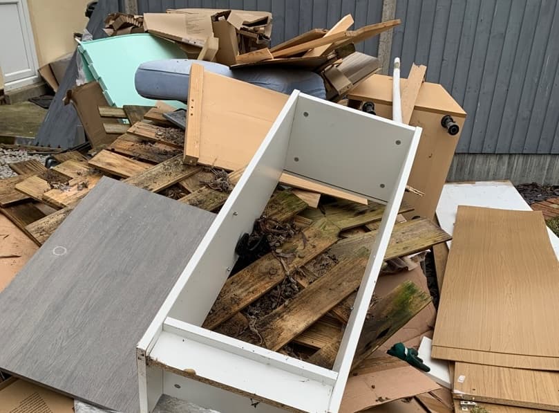 pile of household rubbish and bulky waste outside property in Lewisham