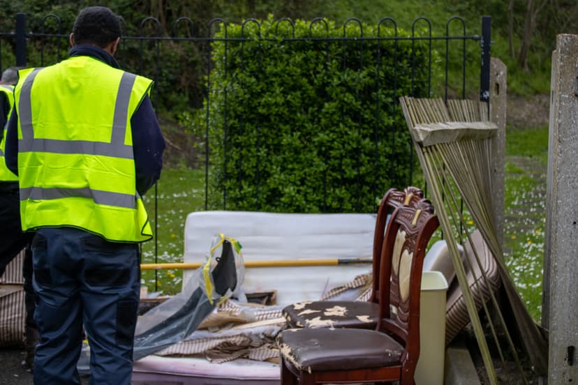 bulky waste collection Lambeth workers loading household waste into truck