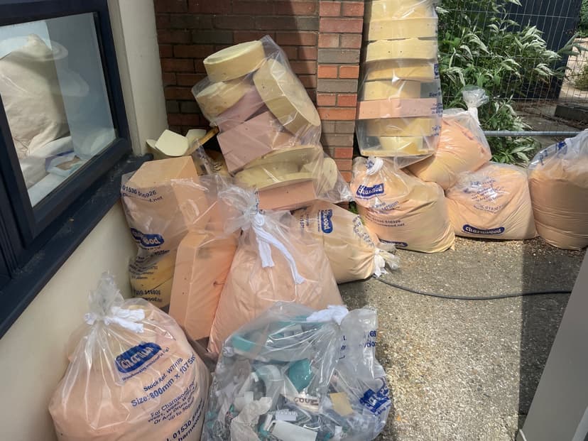 pile of household rubbish and bulky waste outside property in Bristol
