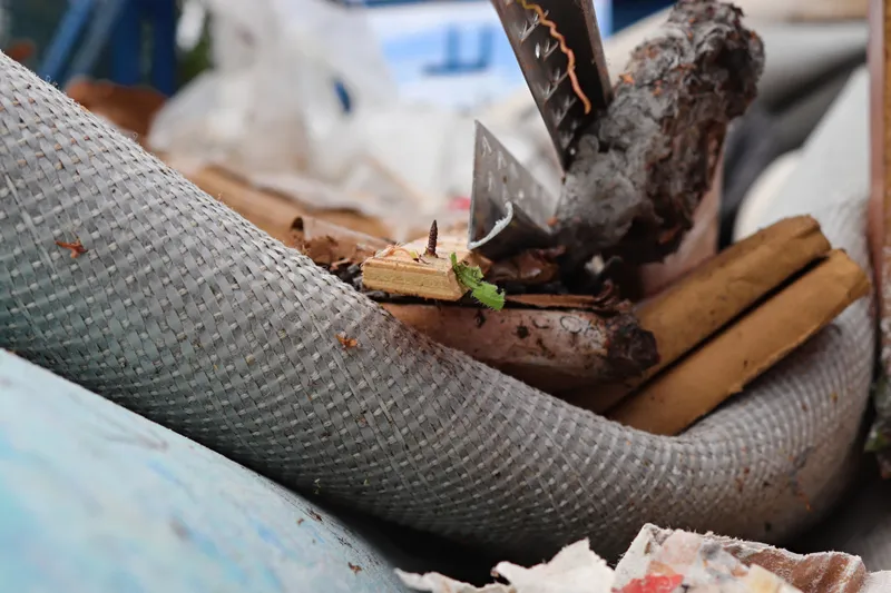 caret underlay and gripper rods ready for disposal