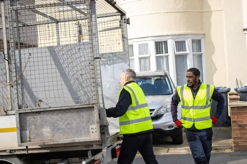 council bulky waste team loading junk