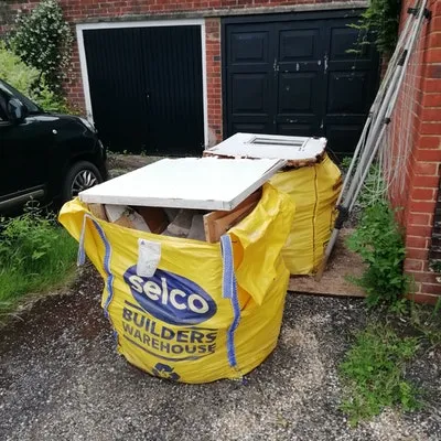 diy waste collected for fee of £160