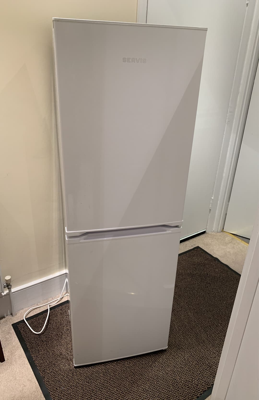 a tall fridge removed for bargain £50 price